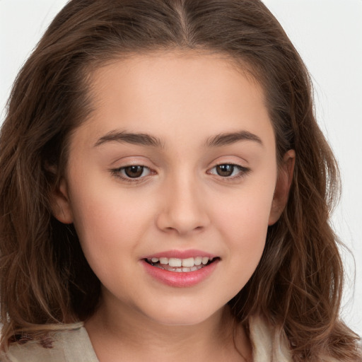 Joyful white child female with long  brown hair and brown eyes