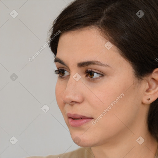 Neutral white young-adult female with medium  brown hair and brown eyes