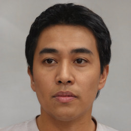 Neutral asian young-adult male with short  black hair and brown eyes