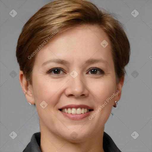 Joyful white adult female with medium  brown hair and brown eyes