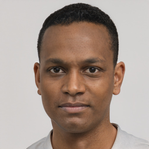 Neutral black young-adult male with short  black hair and brown eyes