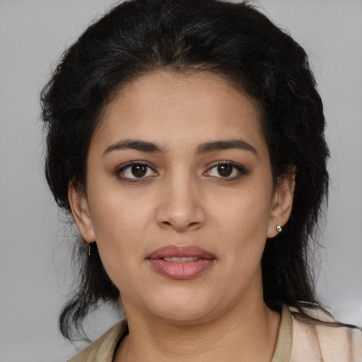 Joyful latino young-adult female with medium  black hair and brown eyes