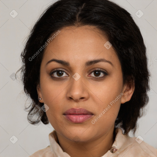 Joyful latino young-adult female with medium  brown hair and brown eyes