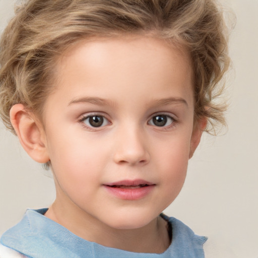 Joyful white child female with short  brown hair and brown eyes