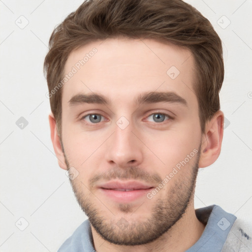 Neutral white young-adult male with short  brown hair and grey eyes