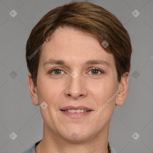 Joyful white adult male with short  brown hair and grey eyes