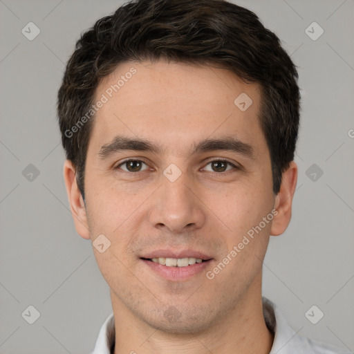 Joyful white young-adult male with short  brown hair and brown eyes