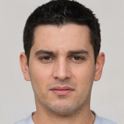 Neutral white young-adult male with short  black hair and brown eyes