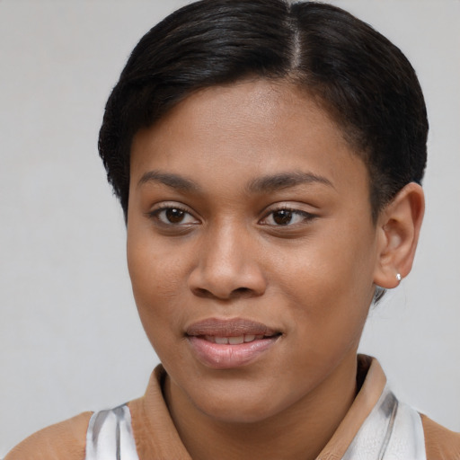 Joyful white young-adult female with short  brown hair and brown eyes