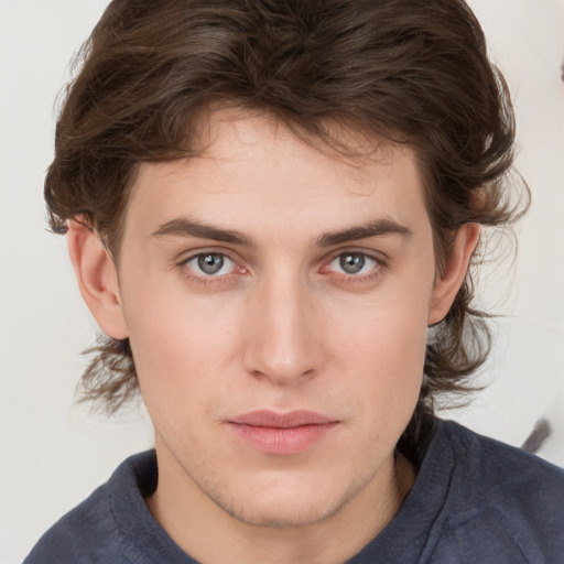 Neutral white young-adult male with medium  brown hair and brown eyes