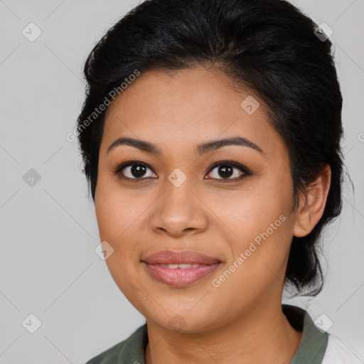 Joyful latino young-adult female with medium  brown hair and brown eyes