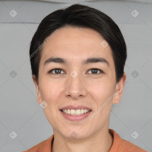 Joyful white young-adult male with short  black hair and brown eyes