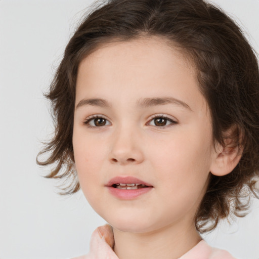 Joyful white child female with medium  brown hair and brown eyes