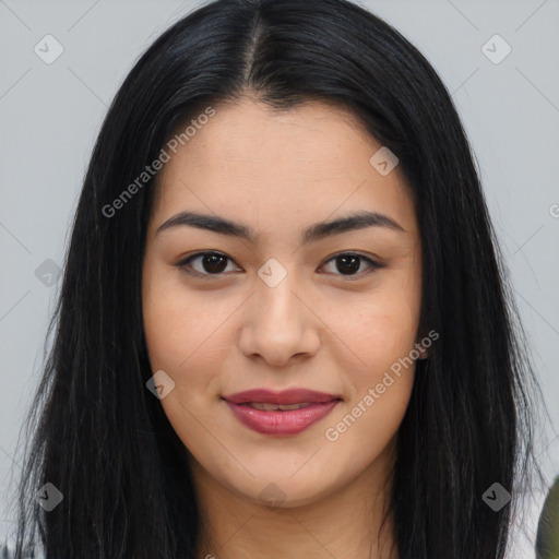 Joyful asian young-adult female with long  brown hair and brown eyes