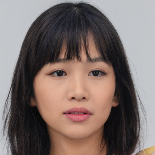 Neutral asian young-adult female with long  brown hair and brown eyes
