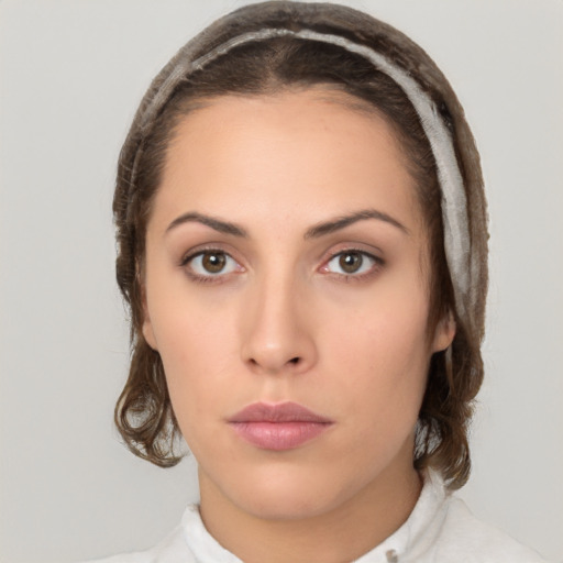 Neutral white young-adult female with medium  brown hair and brown eyes