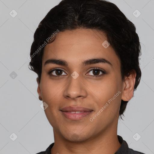 Joyful latino young-adult female with short  black hair and brown eyes