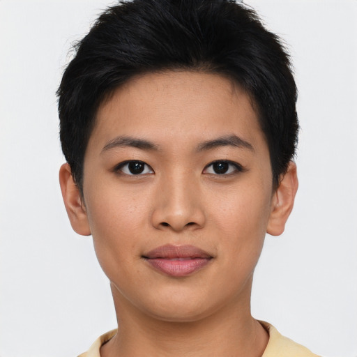 Joyful asian young-adult female with short  black hair and brown eyes