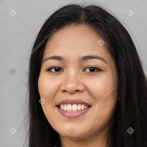 Joyful asian young-adult female with long  brown hair and brown eyes