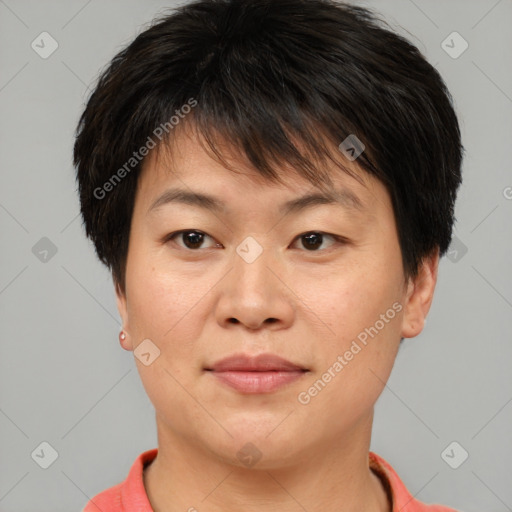 Joyful asian young-adult female with short  brown hair and brown eyes