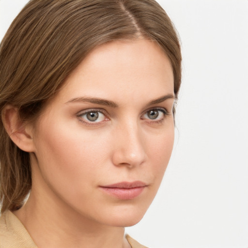 Neutral white young-adult female with medium  brown hair and green eyes