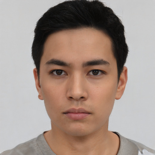 Neutral asian young-adult male with short  black hair and brown eyes