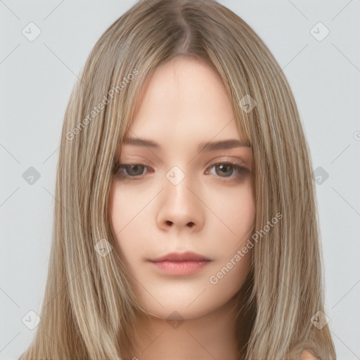 Neutral white young-adult female with long  brown hair and brown eyes