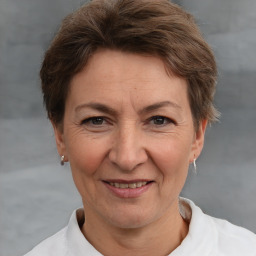 Joyful white adult female with short  brown hair and brown eyes