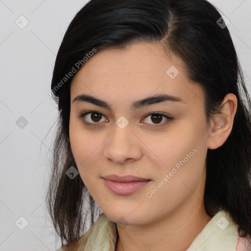 Joyful latino young-adult female with medium  brown hair and brown eyes