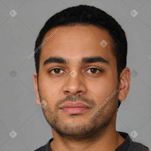 Neutral latino young-adult male with short  black hair and brown eyes