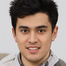 Joyful latino young-adult male with short  brown hair and brown eyes