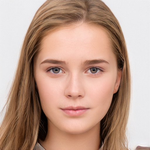 Neutral white young-adult female with long  brown hair and brown eyes