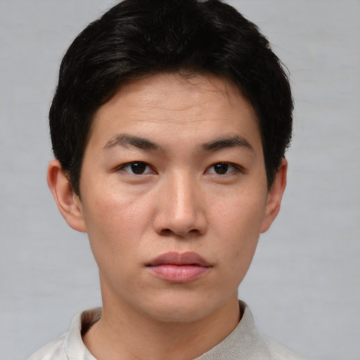 Neutral asian young-adult male with short  brown hair and brown eyes