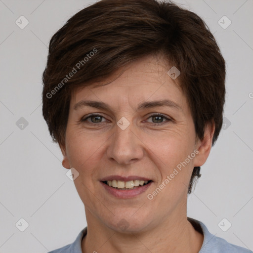 Joyful white adult female with short  brown hair and brown eyes