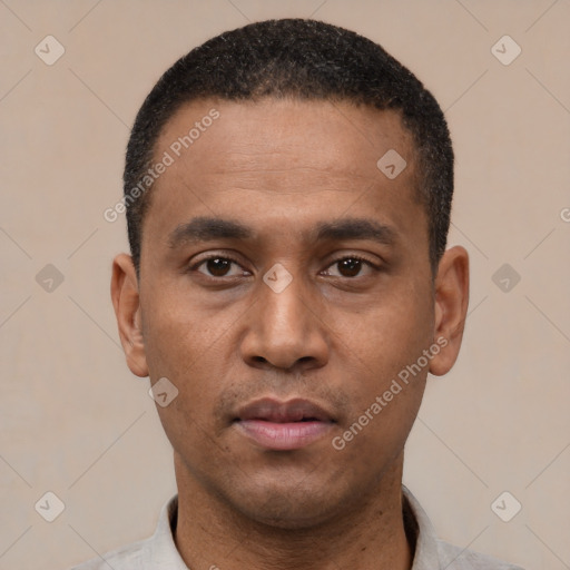 Neutral latino young-adult male with short  black hair and brown eyes