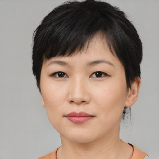 Neutral asian young-adult female with medium  black hair and brown eyes