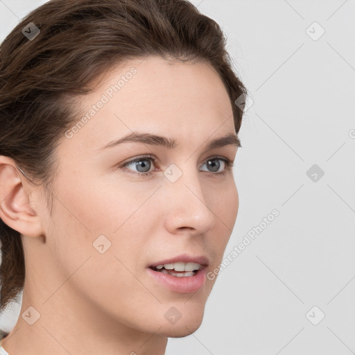 Neutral white young-adult female with medium  brown hair and grey eyes