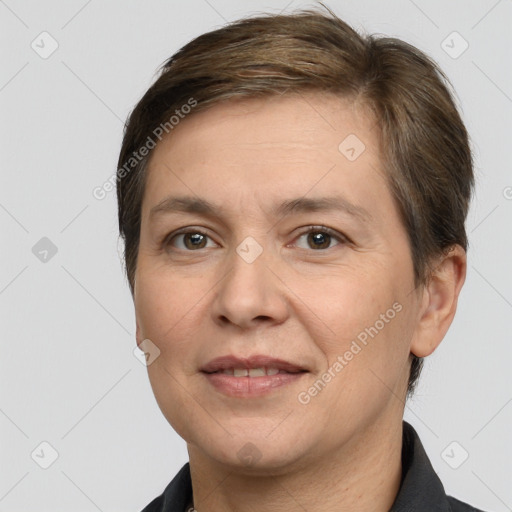 Joyful white adult female with short  brown hair and brown eyes