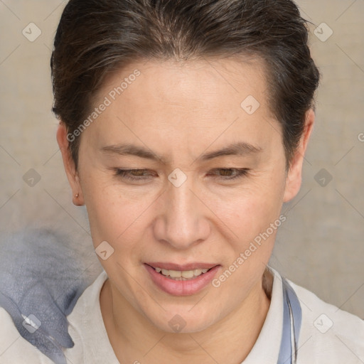 Joyful white adult female with short  brown hair and brown eyes