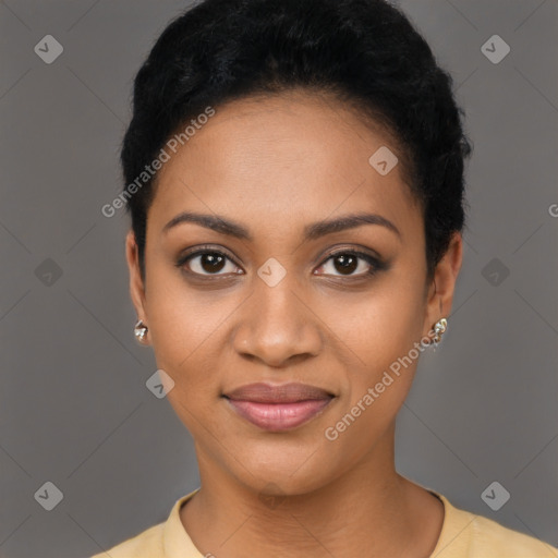 Joyful black young-adult female with short  black hair and brown eyes