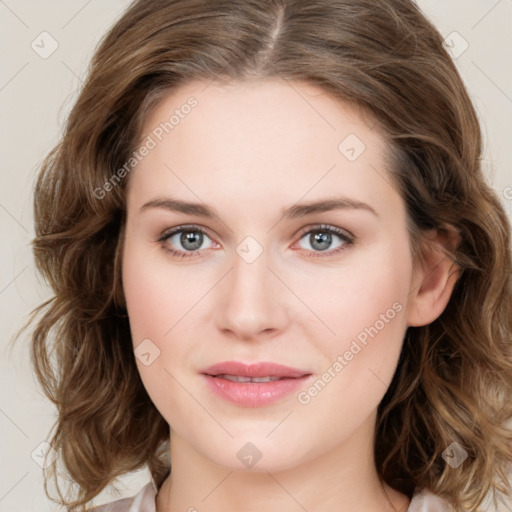 Joyful white young-adult female with medium  brown hair and green eyes