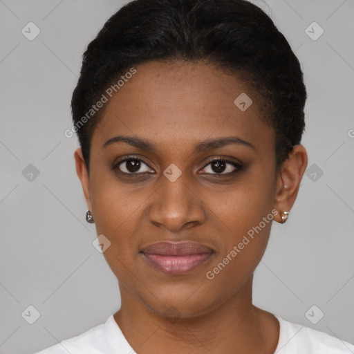 Joyful black young-adult female with short  brown hair and brown eyes