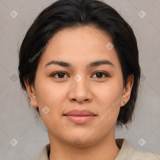 Joyful asian young-adult female with medium  brown hair and brown eyes