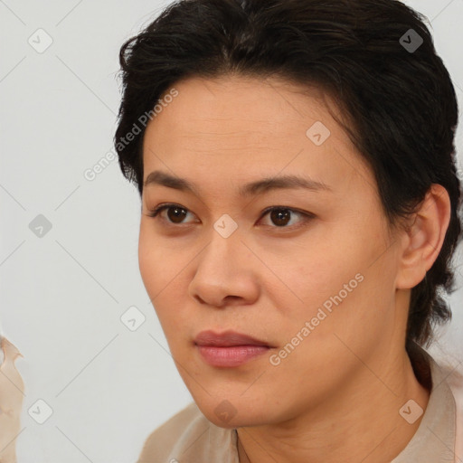 Neutral asian young-adult female with short  brown hair and brown eyes