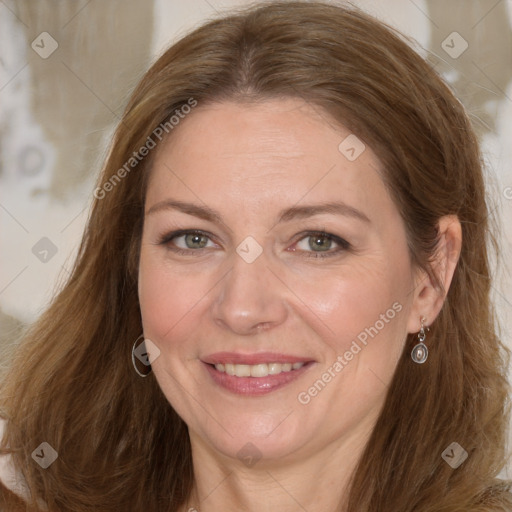 Joyful white adult female with long  brown hair and brown eyes