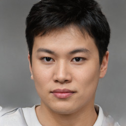 Neutral asian young-adult male with short  brown hair and brown eyes