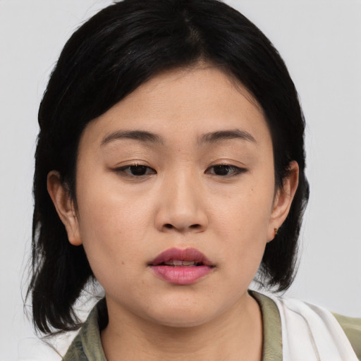 Neutral asian young-adult female with medium  black hair and brown eyes