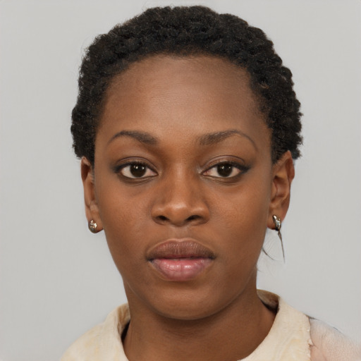 Neutral black young-adult female with short  black hair and brown eyes