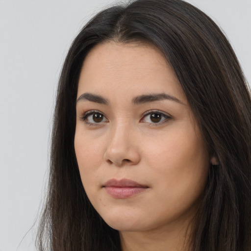 Neutral asian young-adult female with long  brown hair and brown eyes