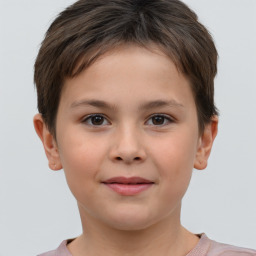 Joyful white child female with short  brown hair and brown eyes